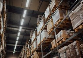 Warehouse interior showing racking, lighting, and infrastructure linked to energy and sustainability upgrades